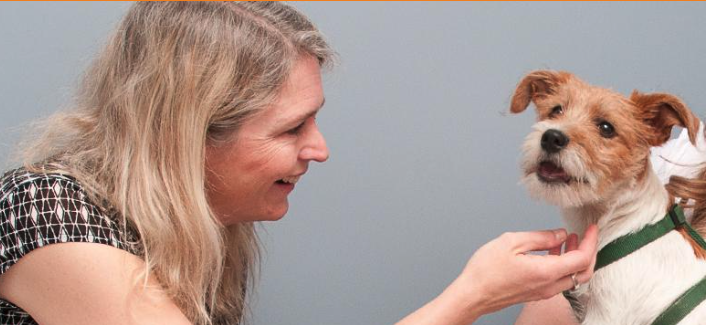Dr. Melissa Bain and a dog